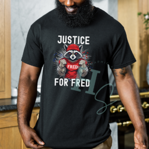 justice for fred shirt graphic tee justice for fred the raccoon honeypegs online store american patriot fred the raccoon shirt adult unisex tee fred the raccoon maga hat shirt red fred the raccoon shirt custom apparel made in america fred the raccoon shirt shipped in amerca small business red white and blue stars flag fred the raccoon shirt justice for fred tee